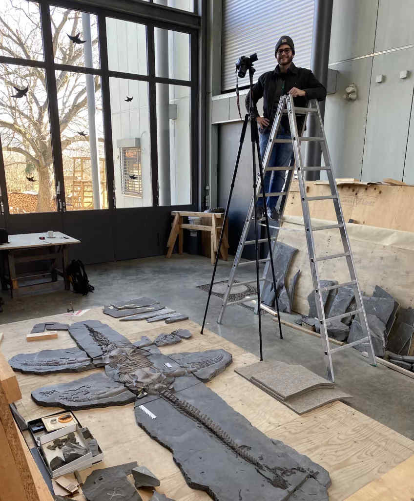 The lead author Miguel Marx photographing the plesiosaur specimen. Image Credit: Lund University